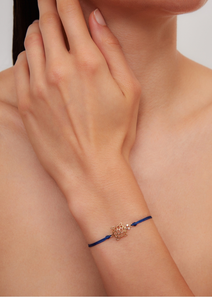 BRACELET FIL TORTUE BLEU MARINE OR JAUNE
