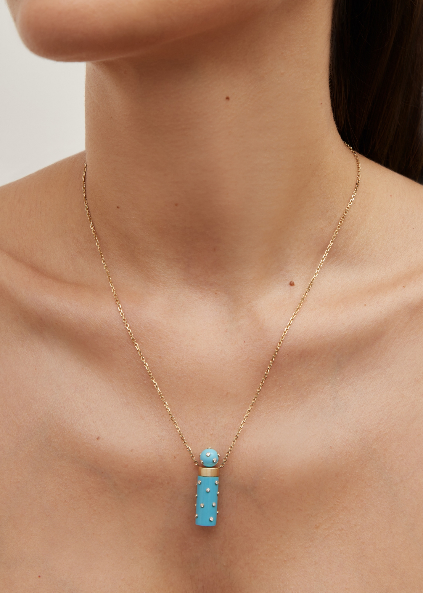 BOUCHON PLUMETIS TURQUOISE OR JAUNE